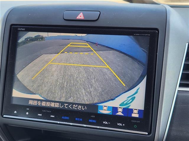 フリードハイブリッド ハイブリッド・EX 禁煙車 バックモニター アダプティブクルコン 衝突被害軽減 車線逸脱防止 誤発進抑制 LEDオートライト 純正9型ナビTV 両側パワスラ ビルトインETC 半革シート 前席シートヒーター スマートキー(9枚目)