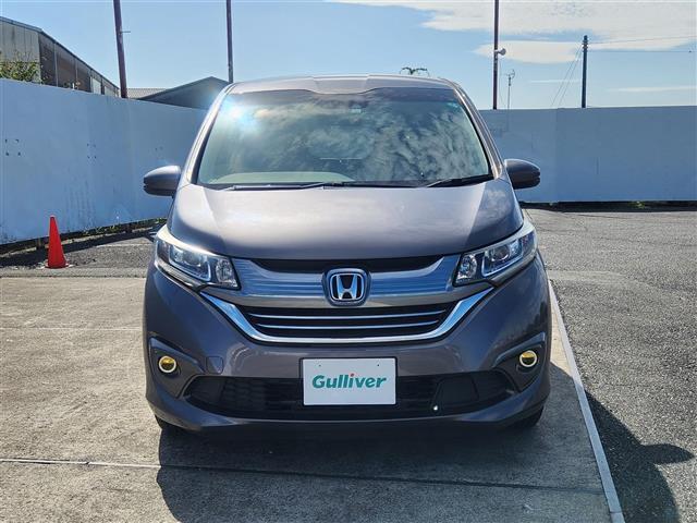 フリードハイブリッド ハイブリッド・EX 禁煙車 バックモニター アダプティブクルコン 衝突被害軽減 車線逸脱防止 誤発進抑制 LEDオートライト 純正9型ナビTV 両側パワスラ ビルトインETC 半革シート 前席シートヒーター スマートキー(14枚目)