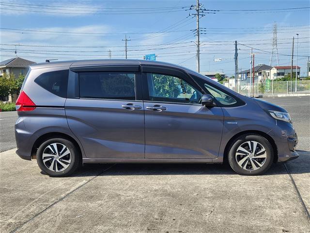 フリードハイブリッド ハイブリッド・EX 禁煙車 バックモニター アダプティブクルコン 衝突被害軽減 車線逸脱防止 誤発進抑制 LEDオートライト 純正9型ナビTV 両側パワスラ ビルトインETC 半革シート 前席シートヒーター スマートキー(15枚目)