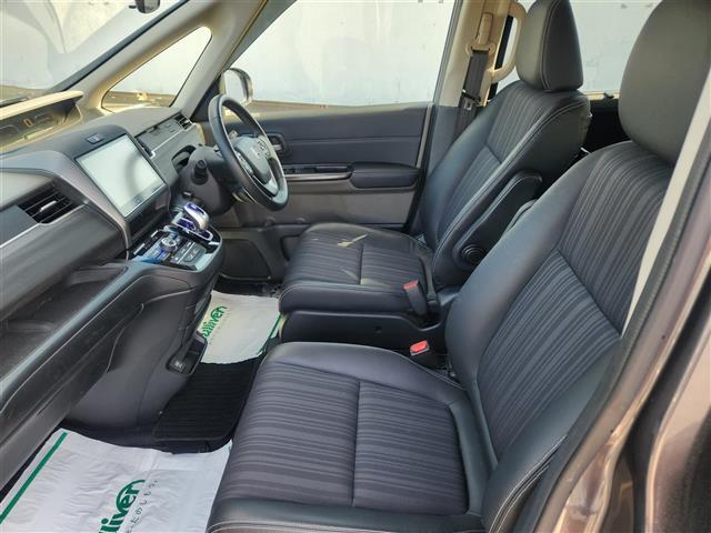 フリードハイブリッド ハイブリッド・EX 禁煙車 バックモニター アダプティブクルコン 衝突被害軽減 車線逸脱防止 誤発進抑制 LEDオートライト 純正9型ナビTV 両側パワスラ ビルトインETC 半革シート 前席シートヒーター スマートキー(29枚目)