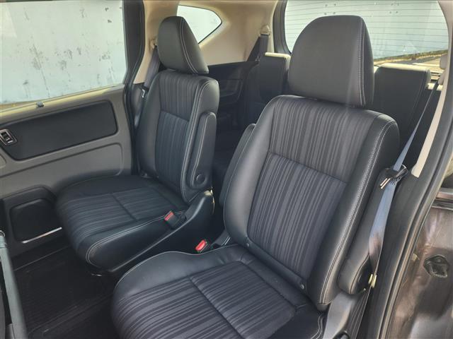 フリードハイブリッド ハイブリッド・EX 禁煙車 バックモニター アダプティブクルコン 衝突被害軽減 車線逸脱防止 誤発進抑制 LEDオートライト 純正9型ナビTV 両側パワスラ ビルトインETC 半革シート 前席シートヒーター スマートキー(30枚目)