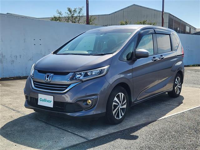 フリードハイブリッド ハイブリッド・EX 禁煙車 バックモニター アダプティブクルコン 衝突被害軽減 車線逸脱防止 誤発進抑制 LEDオートライト 純正9型ナビTV 両側パワスラ ビルトインETC 半革シート 前席シートヒーター スマートキー(33枚目)