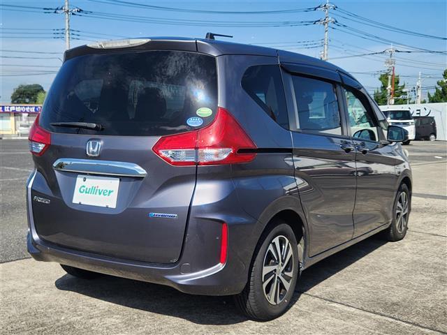 フリードハイブリッド ハイブリッド・EX 禁煙車 バックモニター アダプティブクルコン 衝突被害軽減 車線逸脱防止 誤発進抑制 LEDオートライト 純正9型ナビTV 両側パワスラ ビルトインETC 半革シート 前席シートヒーター スマートキー(34枚目)