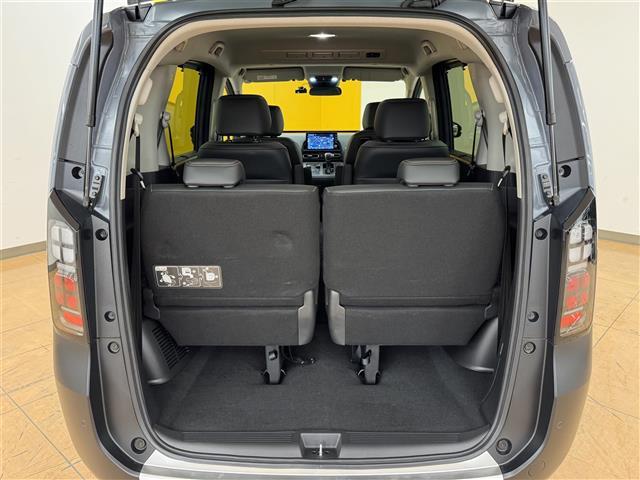 フリード e:HEVクロスター ホンダセンシング ブラインドスポットインフォメーション 純正9インチナビ フルセグTV マルチビューカメラシステム ビルトインETC ドライブレコーダー 両側パワースライドドア 黒革 シートヒーター(19枚目)