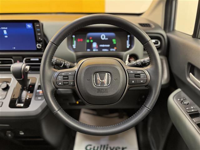 フリード e:HEVクロスター ホンダセンシング ブラインドスポットインフォメーション 純正9インチナビ フルセグTV マルチビューカメラシステム ビルトインETC ドライブレコーダー 両側パワースライドドア 黒革 シートヒーター(33枚目)