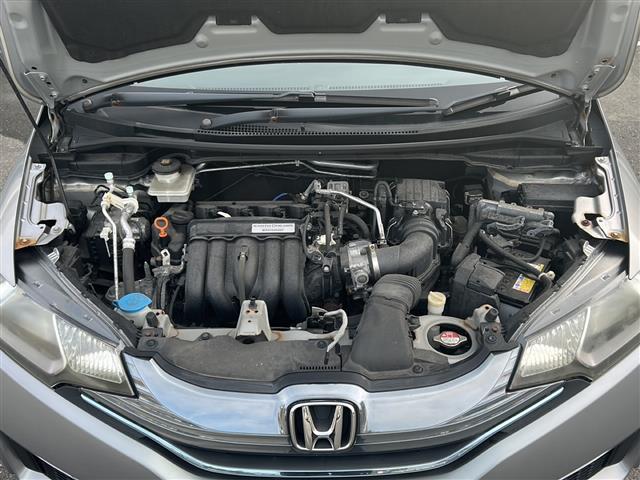 フィットハイブリッド Ｆパッケージ　社外ナビ　ＥＴＣ　ＣＤ　Ｂｌｕｅｔｏｏｔｈ　スマートキー　スペアキー　横滑り防止　エンジンスタートボタン　ＡＡＣ　記録簿（42枚目）