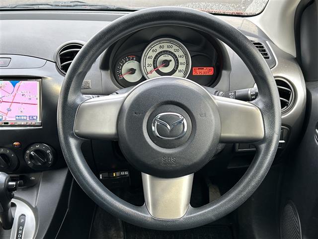 デミオ １３Ｃ　ワンオーナー　社外メモリナビ　ＡＶＮ６６９ＨＤ　地デジＴＶ　ＣＤ　ＤＶＤ　ＢＴ　ラジオ再生　オートライト　純正フロアマット　リモコンキー　取扱説明書　保証書（8枚目）