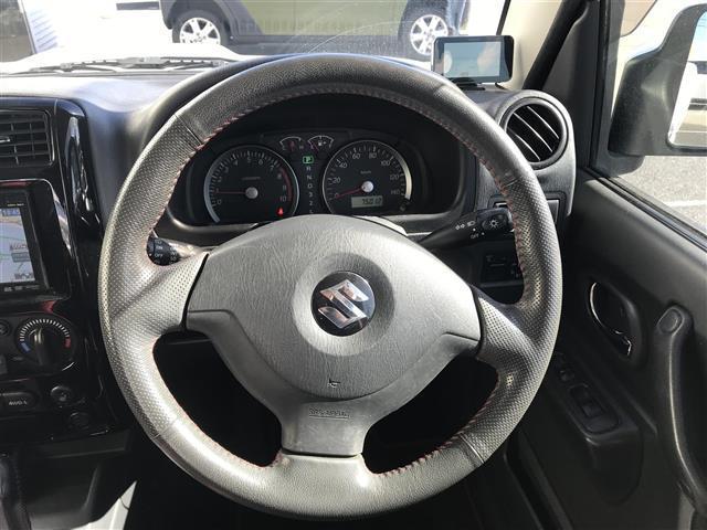 ジムニー クロスアドベンチャー　社外ナビ／ワンセグＴＶ／リモコンキー／レザーシート／シートヒーター／ヘッドライトレベライザー／ＥＴＣ／背面タイヤ／ウインカーミラー（7枚目）