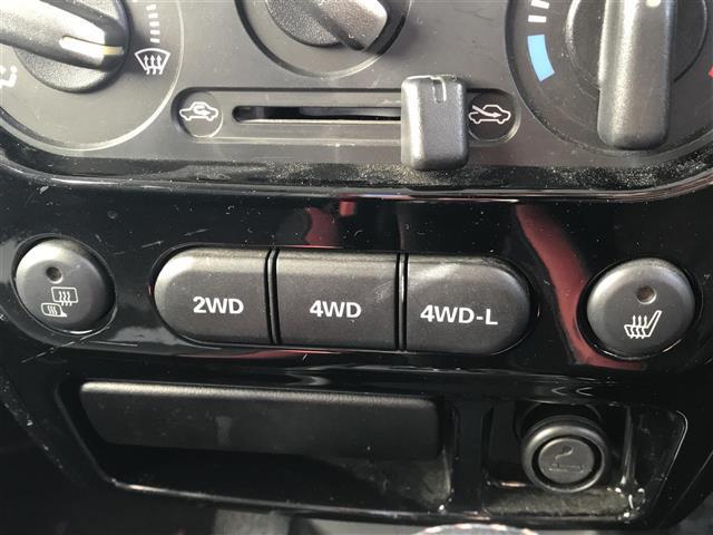 ジムニー クロスアドベンチャー　社外ナビ／ワンセグＴＶ／リモコンキー／レザーシート／シートヒーター／ヘッドライトレベライザー／ＥＴＣ／背面タイヤ／ウインカーミラー（10枚目）