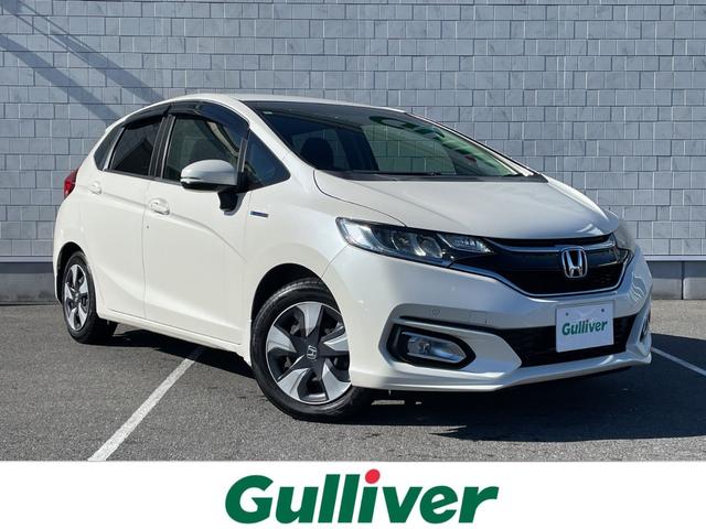 フィットハイブリッド Ｆ　１オーナー　純正インターナビ　Ｂカメラ　ＥＴＣ　横滑り防止装置　盗難防止装置　ＬＥＤヘッドライト　ＬＥＤフォグライト　オートライト　電動格納式リモコンカラードドアミラー（オートリトラミラー）（2枚目）