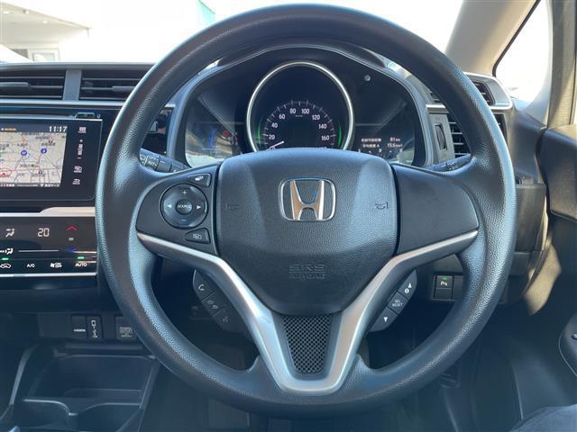 フィットハイブリッド Ｆ　１オーナー　純正インターナビ　Ｂカメラ　ＥＴＣ　横滑り防止装置　盗難防止装置　ＬＥＤヘッドライト　ＬＥＤフォグライト　オートライト　電動格納式リモコンカラードドアミラー（オートリトラミラー）（12枚目）