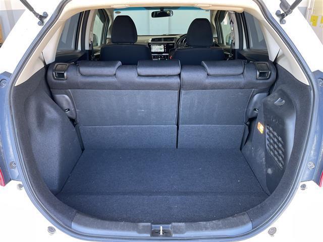 フィットハイブリッド Ｆ　１オーナー　純正インターナビ　Ｂカメラ　ＥＴＣ　横滑り防止装置　盗難防止装置　ＬＥＤヘッドライト　ＬＥＤフォグライト　オートライト　電動格納式リモコンカラードドアミラー（オートリトラミラー）（24枚目）