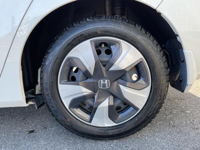 フィットハイブリッド Ｆ　１オーナー　純正インターナビ　Ｂカメラ　ＥＴＣ　横滑り防止装置　盗難防止装置　ＬＥＤヘッドライト　ＬＥＤフォグライト　オートライト　電動格納式リモコンカラードドアミラー（オートリトラミラー）（49枚目）