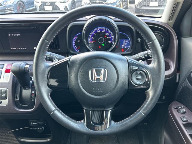 N-ONE プレミアム ツアラー・Lパッケージ スマートフォン連携ディスプレイオーディオ バックカメラ 横滑り防止装置 盗難防止装置 クルーズコントロール 本革巻ステアリング パドルシフト オートライト ディスチャージヘッドライト フォグランプ(10枚目)