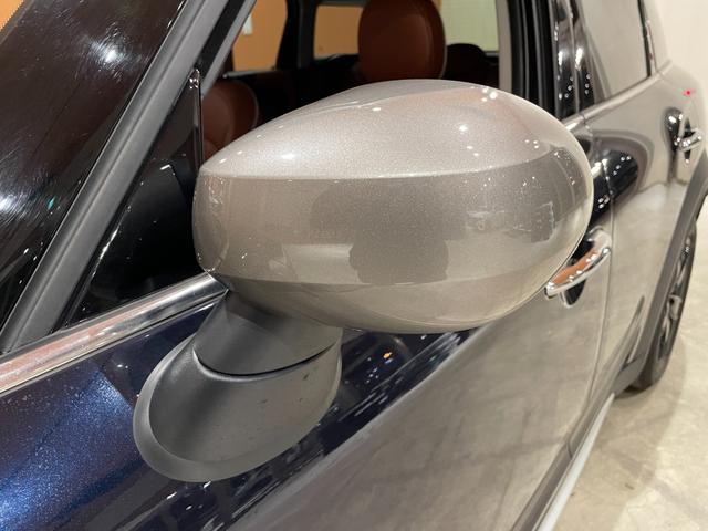 ＭＩＮＩ クーパーＤ　クロスオーバー　オール４　プレミアムプラスＰＫＧ　ＣＬＡＳＳＩＣＴＲＩＭ　シルバールーフ＆ミラーキャップ　ＡＣＣ　マルチディスプレイメーターパネル　革調シートカバー　シートヒーター　純正ＨＤＤナビ　バックカメラ　禁煙車（46枚目）
