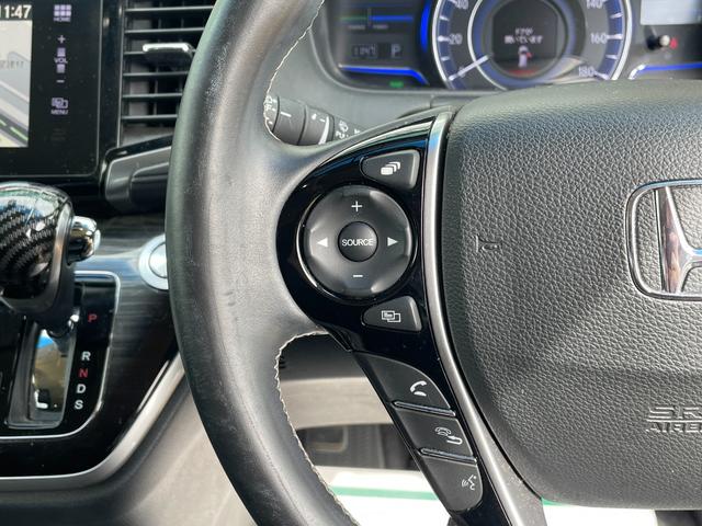 オデッセイハイブリッド ハイブリッド　純正ナビ　フルセグ　両側パワースライドドア　バックカメラ　ビルトインＥＴＣ　ドラレコ　純正フリップダウンモニター　クルコン　ホンダセンシング　革巻きステアリング　パワーシート　スマートキーシステム（4枚目）