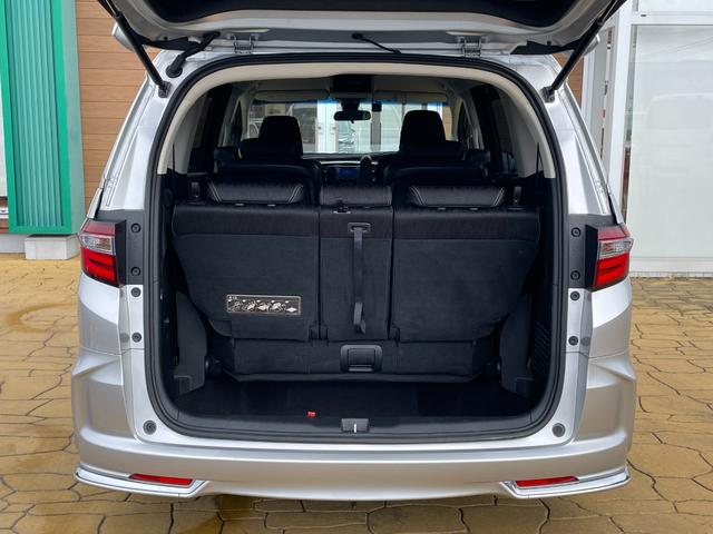 オデッセイハイブリッド ハイブリッド　純正ナビ　フルセグ　両側パワースライドドア　バックカメラ　ビルトインＥＴＣ　ドラレコ　純正フリップダウンモニター　クルコン　ホンダセンシング　革巻きステアリング　パワーシート　スマートキーシステム（32枚目）