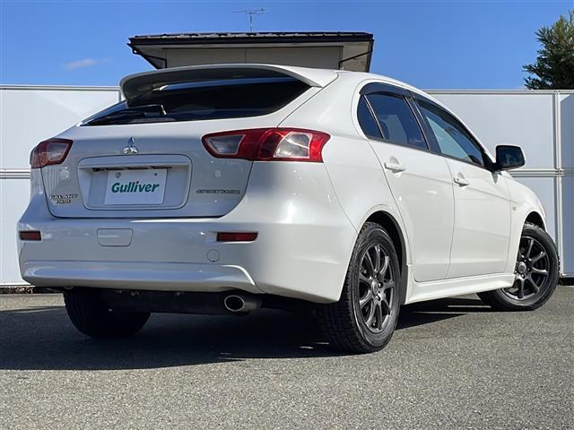 ギャランフォルティススポーツバック スポーツ　純正ＨＤＤナビ　バックカメラ　ＣＤ／ＤＶＤ再生　ＴＶ　クルーズコントロール　パドルシフト　ステアリングスイッチ　１２Ｖソケット　スマートキー　スペアタイヤ　ＨＩＤオートライト　１６インチＡＷ（33枚目）