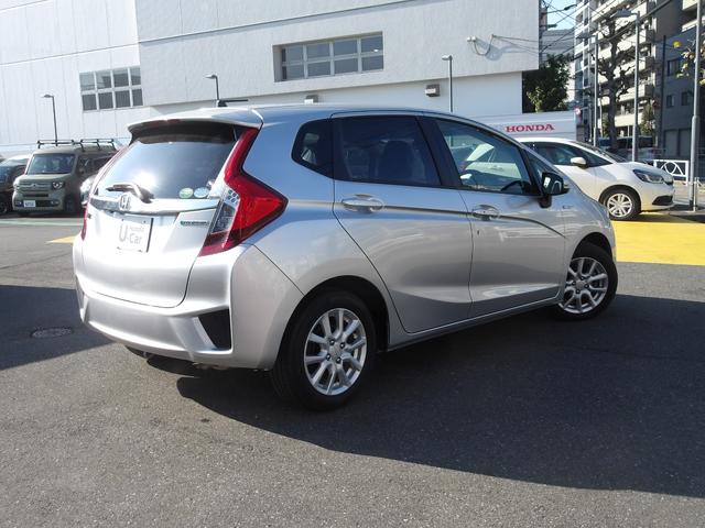 フィットハイブリッド Ｆパッケージ　弊社下取ワンオーナー車　Ｂｌｕｅｔｏｏｔｈ接続対応ギャザズメモリーナビ　リアカメラ　ＥＴＣ　スマートキー　アイドリングストップ　社外アルミホイール（2枚目）