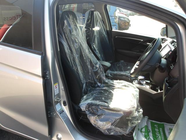 フィットハイブリッド Ｆパッケージ　弊社下取ワンオーナー車　Ｂｌｕｅｔｏｏｔｈ接続対応ギャザズメモリーナビ　リアカメラ　ＥＴＣ　スマートキー　アイドリングストップ　社外アルミホイール（5枚目）