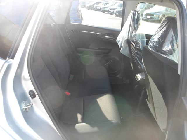 フィットハイブリッド Ｆパッケージ　弊社下取ワンオーナー車　Ｂｌｕｅｔｏｏｔｈ接続対応ギャザズメモリーナビ　リアカメラ　ＥＴＣ　スマートキー　アイドリングストップ　社外アルミホイール（6枚目）