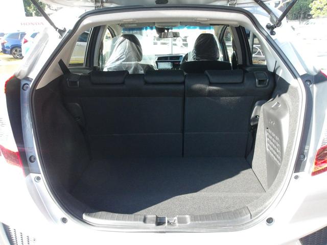 フィットハイブリッド Ｆパッケージ　弊社下取ワンオーナー車　Ｂｌｕｅｔｏｏｔｈ接続対応ギャザズメモリーナビ　リアカメラ　ＥＴＣ　スマートキー　アイドリングストップ　社外アルミホイール（7枚目）