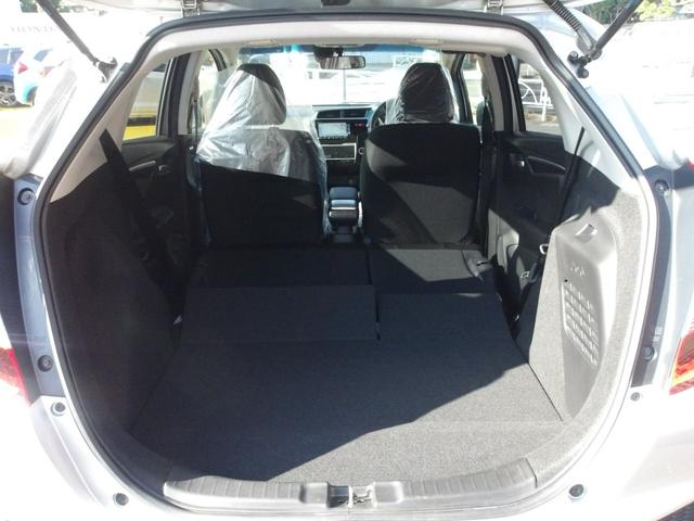 フィットハイブリッド Ｆパッケージ　弊社下取ワンオーナー車　Ｂｌｕｅｔｏｏｔｈ接続対応ギャザズメモリーナビ　リアカメラ　ＥＴＣ　スマートキー　アイドリングストップ　社外アルミホイール（8枚目）