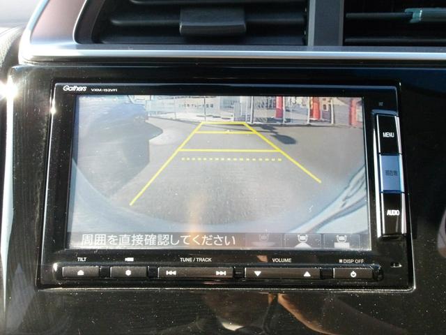 フィットハイブリッド Ｆパッケージ　弊社下取ワンオーナー車　Ｂｌｕｅｔｏｏｔｈ接続対応ギャザズメモリーナビ　リアカメラ　ＥＴＣ　スマートキー　アイドリングストップ　社外アルミホイール（12枚目）