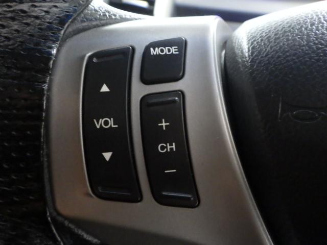 フリードハイブリッド ジャストセレクション 禁煙車 2列目ベンチシート(7人乗り) ディスチャージヘッドライト 両側PSD スマートキー クルーズコントロール ディスプレーオーディオ リアカメラ ドラレコ セキュリティー 横滑り防止機能 記録簿(11枚目)