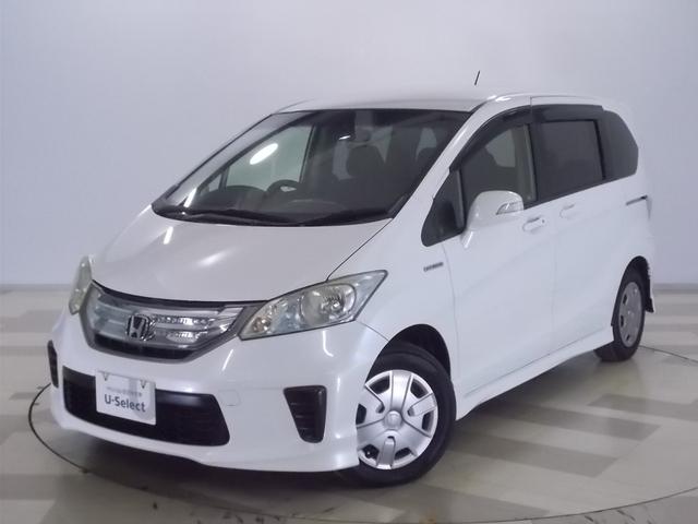 フリードハイブリッド ジャストセレクション 禁煙車 2列目ベンチシート(7人乗り) ディスチャージヘッドライト 両側PSD スマートキー クルーズコントロール ディスプレーオーディオ リアカメラ ドラレコ セキュリティー 横滑り防止機能 記録簿(22枚目)