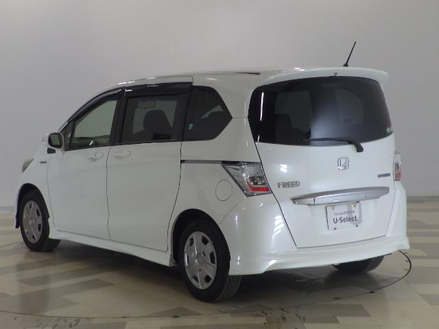 フリードハイブリッド ジャストセレクション 禁煙車 2列目ベンチシート(7人乗り) ディスチャージヘッドライト 両側PSD スマートキー クルーズコントロール ディスプレーオーディオ リアカメラ ドラレコ セキュリティー 横滑り防止機能 記録簿(24枚目)