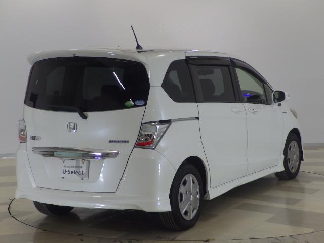 フリードハイブリッド ジャストセレクション 禁煙車 2列目ベンチシート(7人乗り) ディスチャージヘッドライト 両側PSD スマートキー クルーズコントロール ディスプレーオーディオ リアカメラ ドラレコ セキュリティー 横滑り防止機能 記録簿(26枚目)