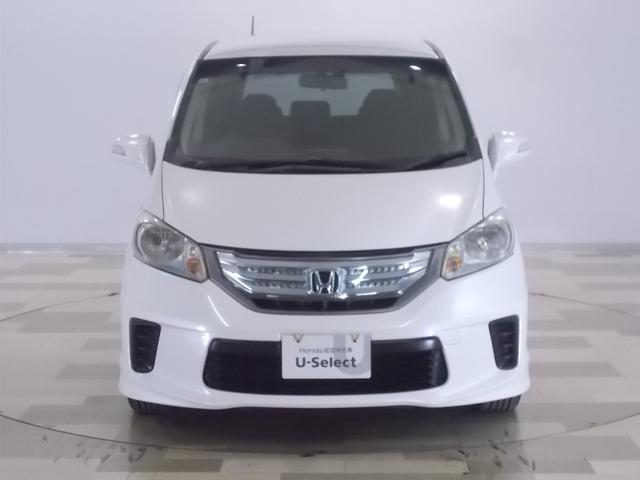 フリードハイブリッド ジャストセレクション 禁煙車 2列目ベンチシート(7人乗り) ディスチャージヘッドライト 両側PSD スマートキー クルーズコントロール ディスプレーオーディオ リアカメラ ドラレコ セキュリティー 横滑り防止機能 記録簿(29枚目)