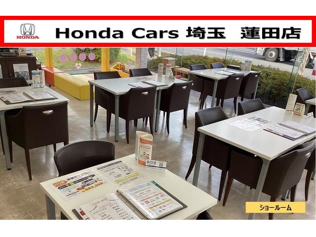 フリードハイブリッド ジャストセレクション 禁煙車 2列目ベンチシート(7人乗り) ディスチャージヘッドライト 両側PSD スマートキー クルーズコントロール ディスプレーオーディオ リアカメラ ドラレコ セキュリティー 横滑り防止機能 記録簿(39枚目)