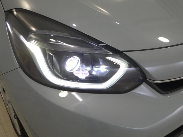 フィット e:HEVホーム 禁煙車 元デモカー ホンダコネクトナビ リアカメラ ETC ドラレコ 前後誤発進抑制機能 クリソナ 助手席エアバッグ 運転席エアバッグ 1オナ アイドリングストップ LEDライト USB接続 ABS(29枚目)
