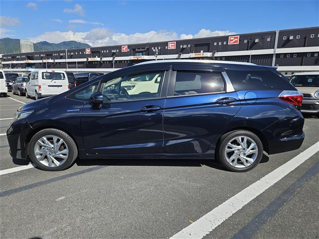 シャトル ハイブリッドZ ストラーダナビ フルセグ バックカメラ ETC クルコン シティブレーキアクティブシステム オートライト 革巻きステアリング パドルシフト シートヒーター シルバールーフレール 禁煙車(12枚目)