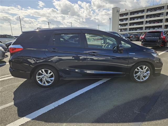 シャトル ハイブリッドZ ストラーダナビ フルセグ バックカメラ ETC クルコン シティブレーキアクティブシステム オートライト 革巻きステアリング パドルシフト シートヒーター シルバールーフレール 禁煙車(14枚目)