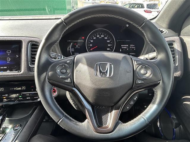 ヴェゼル ハイブリッドＲＳ・ホンダセンシング　ホンダセンシング　アダプティブクルーズコントロール　純正８インチナビ　バックカメラ　ＥＴＣ　ドライブレコーダー　ハーフレザーシート　シートヒーター　コンフォートビューパッケージ　純正１８インチＡＷ（21枚目）