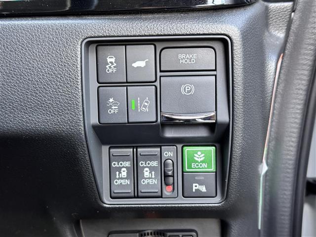 オデッセイハイブリッド ｅ：ＨＥＶアブソルート・ＥＸ　ホンダセンシング　ＢＳＭ　純正１１．６インチフリップダウンモニター　純正１０インチナビ　マルチビューカメラシステム　ＥＴＣ２．０　ドライブレコーダー　ハンズフリーパワーバックドア　両側電動スライドドア（6枚目）