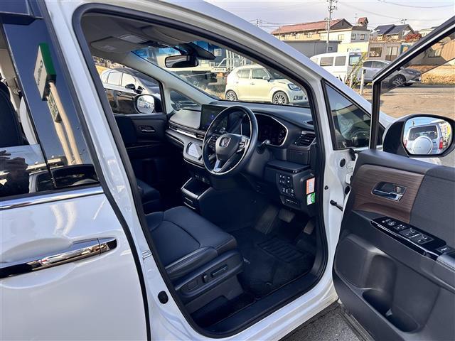 オデッセイハイブリッド ｅ：ＨＥＶアブソルート・ＥＸ　ホンダセンシング　ＢＳＭ　純正１１．６インチフリップダウンモニター　純正１０インチナビ　マルチビューカメラシステム　ＥＴＣ２．０　ドライブレコーダー　ハンズフリーパワーバックドア　両側電動スライドドア（27枚目）