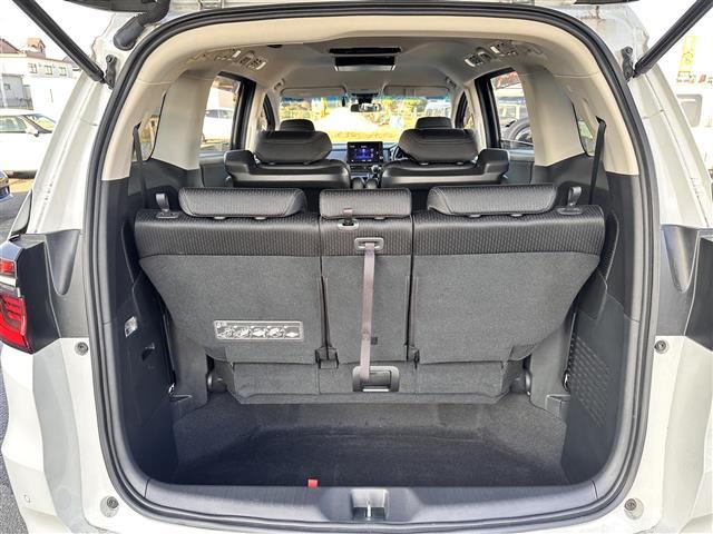 オデッセイハイブリッド ｅ：ＨＥＶアブソルート・ＥＸ　ホンダセンシング　ＢＳＭ　純正１１．６インチフリップダウンモニター　純正１０インチナビ　マルチビューカメラシステム　ＥＴＣ２．０　ドライブレコーダー　ハンズフリーパワーバックドア　両側電動スライドドア（33枚目）