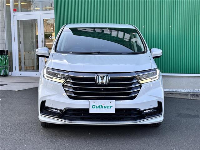 オデッセイハイブリッド ｅ：ＨＥＶアブソルート・ＥＸ　ホンダセンシング　ＢＳＭ　純正１１．６インチフリップダウンモニター　純正１０インチナビ　マルチビューカメラシステム　ＥＴＣ２．０　ドライブレコーダー　ハンズフリーパワーバックドア　両側電動スライドドア（34枚目）