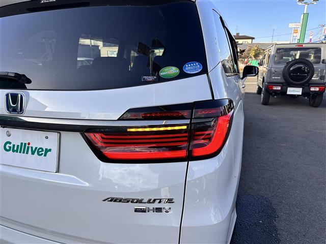 オデッセイハイブリッド ｅ：ＨＥＶアブソルート・ＥＸ　ホンダセンシング　ＢＳＭ　純正１１．６インチフリップダウンモニター　純正１０インチナビ　マルチビューカメラシステム　ＥＴＣ２．０　ドライブレコーダー　ハンズフリーパワーバックドア　両側電動スライドドア（40枚目）