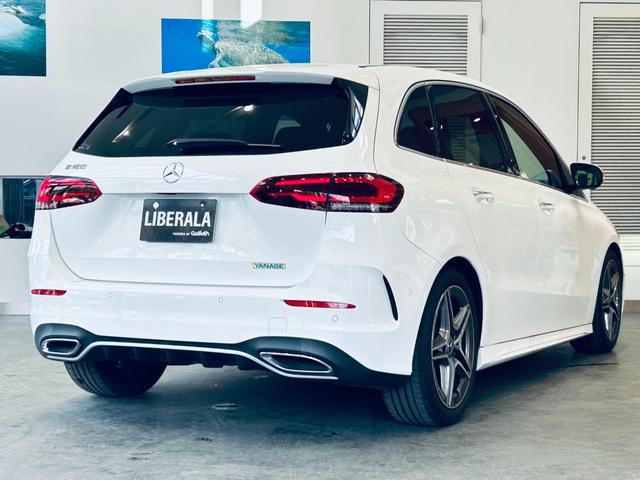 Bクラス B180 AMGレザーエクスクルーシブパッケージ レーダーセーフティ アドバンスドP HUD 純正ナビ TV 360° 純18インチAW LED アンビエントライト 電動リアゲート 赤黒革 メモリパワーシート シートヒーター ワイヤレス充電(7枚目)