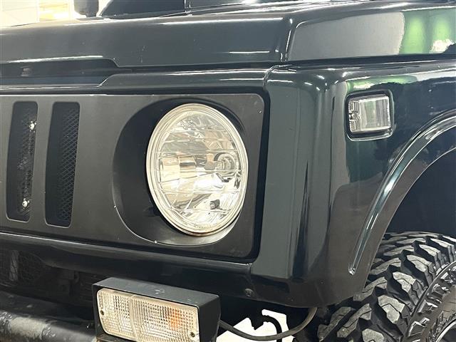 ジムニー ワイルドウインドリミテッド　５ＭＴ／リフトアップ／マッドタイヤ／マフラー（9枚目）