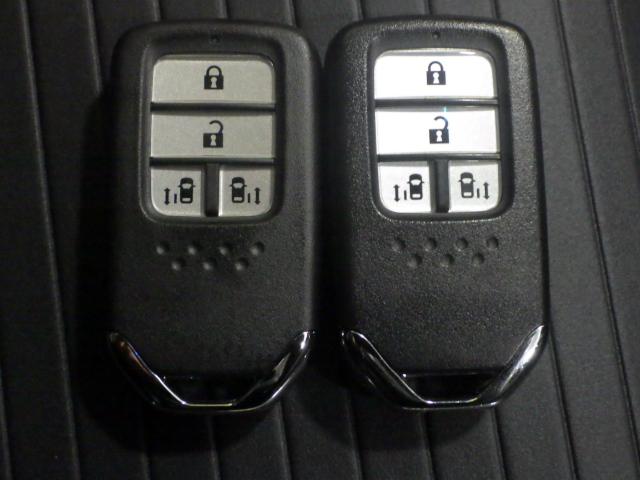 オデッセイハイブリッド ハイブリッドアブソルート・EXホンダセンシング 禁煙車 ETC マルチビューカメラ 電動シート シートヒーター 両側電動スライドドア LEDヘッドライト 衝突被害軽減S PWシート LEDライト 地上デジタル 3列シート オートエアコン ESC(15枚目)