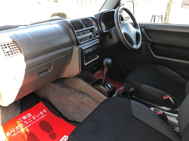 ジムニー ワイルドウインド　８０周年記念車　４ＷＤ　モーターファーム３インチリフトアップ　社外ラテラル　社外マフラ－　社外１６インチアルミ　マッドタイヤ　ロングブレーキホース　ＬＥＤヘッド　ＬＥＤテール　背面タイヤ　ＥＴＣ（3枚目）