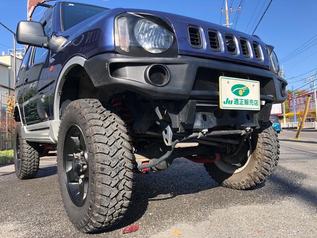 ジムニー ワイルドウインド　８０周年記念車　４ＷＤ　モーターファーム３インチリフトアップ　社外ラテラル　社外マフラ－　社外１６インチアルミ　マッドタイヤ　ロングブレーキホース　ＬＥＤヘッド　ＬＥＤテール　背面タイヤ　ＥＴＣ（12枚目）