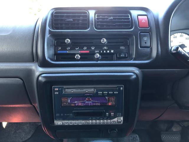 ジムニー ワイルドウインド　８０周年記念車　４ＷＤ　モーターファーム３インチリフトアップ　社外ラテラル　社外マフラ－　社外１６インチアルミ　マッドタイヤ　ロングブレーキホース　ＬＥＤヘッド　ＬＥＤテール　背面タイヤ　ＥＴＣ（22枚目）