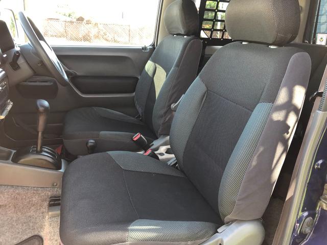 ジムニー ワイルドウインド　８０周年記念車　４ＷＤ　モーターファーム３インチリフトアップ　社外ラテラル　社外マフラ－　社外１６インチアルミ　マッドタイヤ　ロングブレーキホース　ＬＥＤヘッド　ＬＥＤテール　背面タイヤ　ＥＴＣ（28枚目）